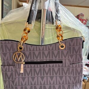 Elegant Monogram Shoulder Bag with Gold Accents